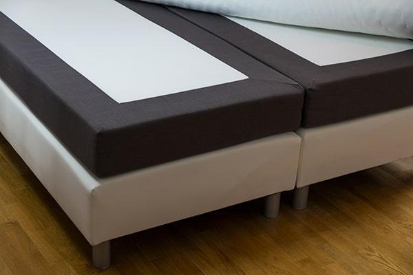 before box spring removal, make sure to clear the area around the bed and remove any bedding or linens